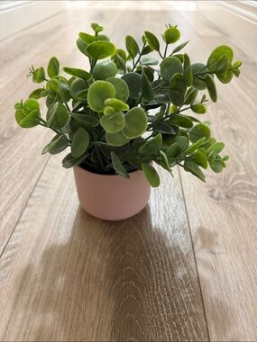 Pink small fake greenery plant